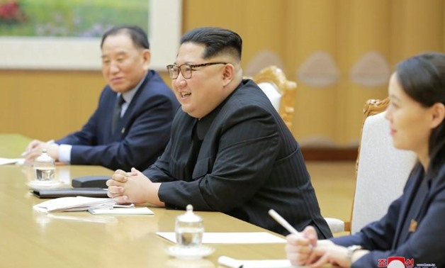 FILE PHOTO: North Korean leader Kim Jong Un meets members of the special delegation of South Korea's President in this photo released by North Korea's Korean Central News Agency (KCNA) on March 6, 2018. KCNA/via Reuters