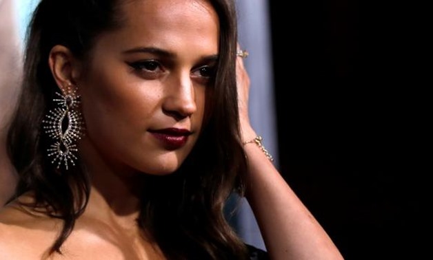 Cast member Alicia Vikander poses at the premiere for "Tomb Raider" in Los Angeles, California, U.S., March 12, 2018. REUTERS/Mario Anzuoni