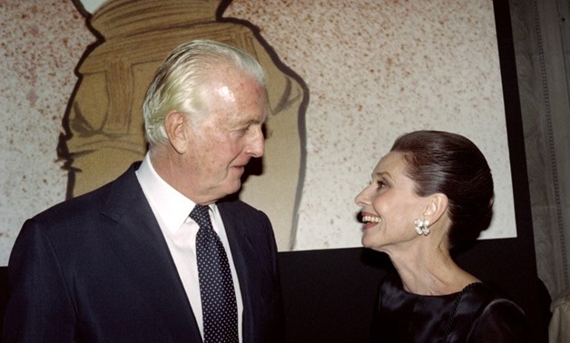 French designer Hubert de Givenchy and American actress Audrey Hepburn worked together for over 40 years - AFP/File / PIERRE GUILLAUD
