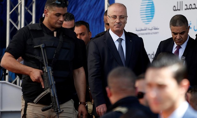 Palestinian Prime Minister Rami Hamdallah arrives at the inauguration ceremony of a waste treatment plant after an explosion targeted his convoy, in the northern Gaza Strip March 13, 2018. REUTERS/Mohammed Salem