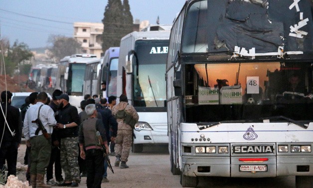Syria evacuations from  Fuaa and Kafraya towns resume after deadly bombing - AFP p
