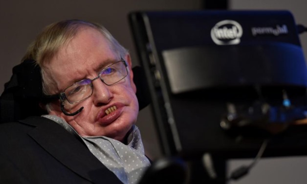 FILE PHOTO: British scientist and theoretical physicist Stephen Hawking attends a launch event for a new award for science communication, called the Stephen Hawking Medal for Science Communication, in London, Britain December 16, 2015. REUTERS/Toby Melvil