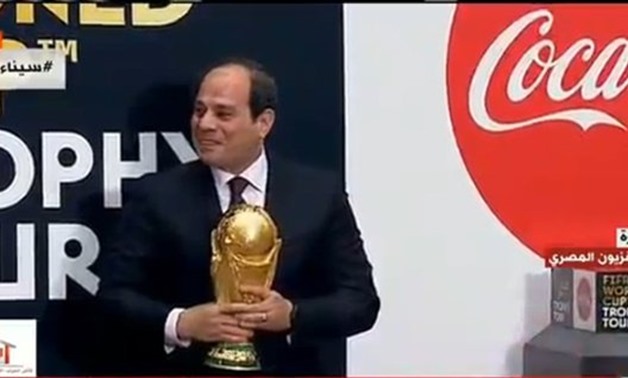 President Abdel Fatah al-Sisi with the World Cup trophy - FILE