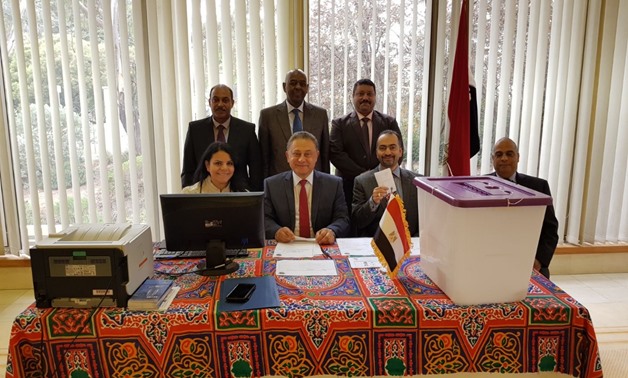 Egyptian Ambassador to Australia, Mohamed Khairat, with the embassy staff during the 2018 presidential election in Canberra - Egypt Today