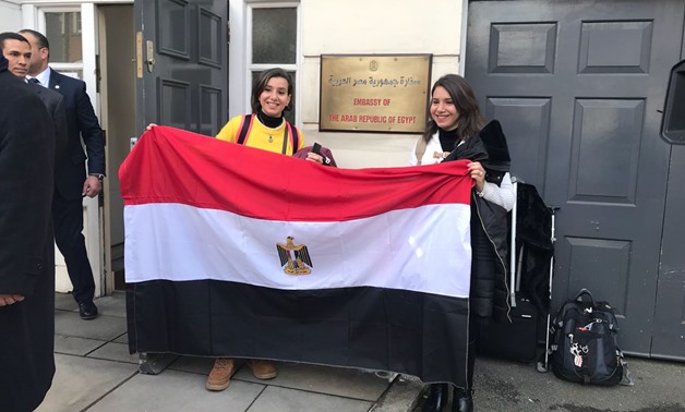FILE - Egyptians in front of the Egyptian Embassy
