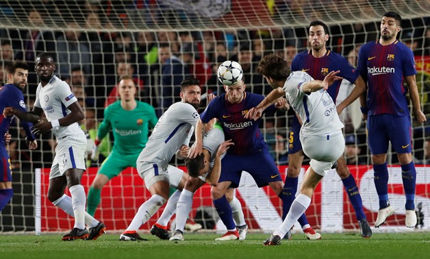 Soccer Football - Champions League Round of 16 Second Leg - FC Barcelona vs Chelsea - Camp Nou, Barcelona, Spain - March 14, 2018 Chelsea's Marcos Alonso hits the post from a free kick as Chelsea's Cesar Azpilicueta and Olivier Giroud is in action with Ba
