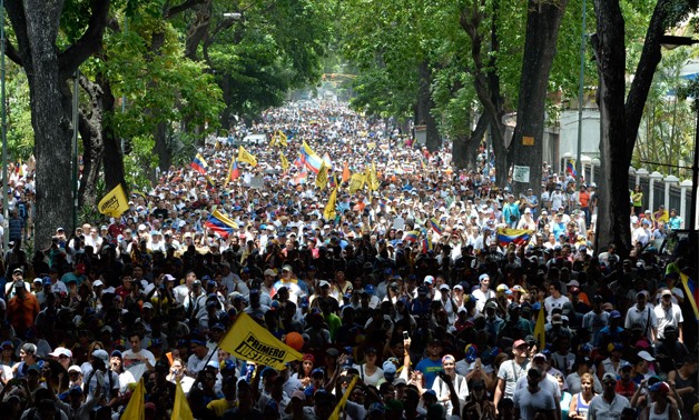 Thousands of demonstrators rally against Venezuelan President Nicolas Maduro in Caracas on April 19, 2017 - AFP/Federico PARRA