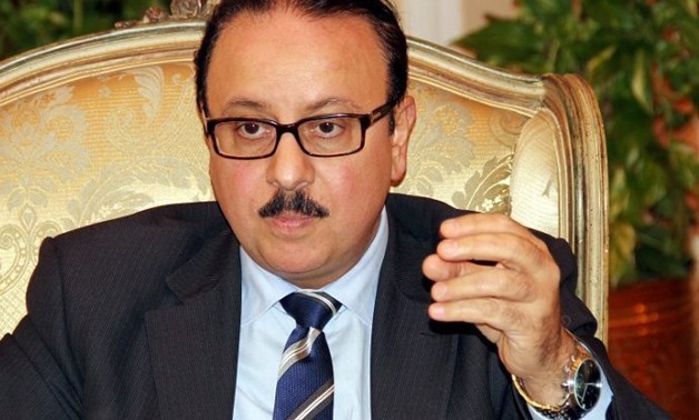 FILE - Communication Minister Yasser el-Kadi