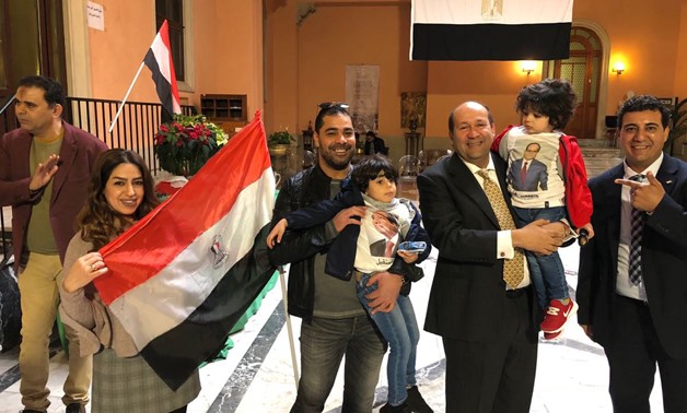 Egyptian ambassador to Rome  Hesham Badr with expats after voting in presidential election- Egypt Today