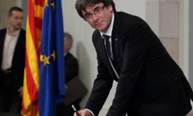 AFP/File | Carles Puigdemont signed a declaration of independence for Catalonia in October, but Spain says the gesture was illegal and irrelevant under the national constitution - AFP
