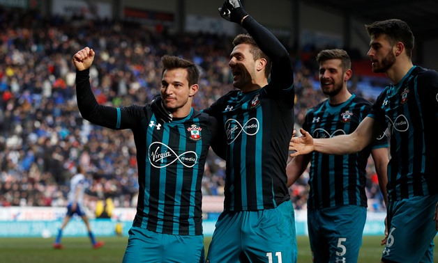 Soccer Football - FA Cup Quarter Final - Wigan Athletic vs Southampton - DW Stadium, Wigan, Britain - March 18, 2018 Southampton's Cedric Soares celebrates scoring their second goal with Dusan Tadic and teammates REUTERS/Phil Noble
