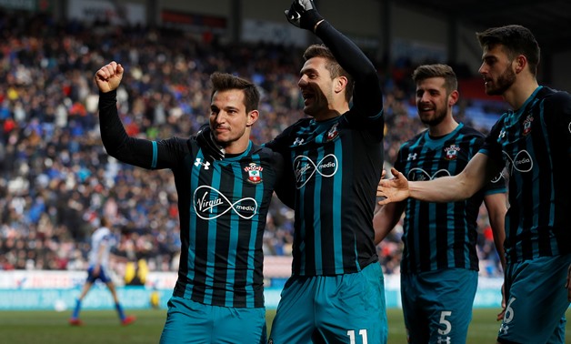 Soccer Football - FA Cup Quarter Final - Wigan Athletic vs Southampton - DW Stadium, Wigan, Britain - March 18, 2018 Southampton's Cedric Soares celebrates scoring their second goal with Dusan Tadic and teammates REUTERS/Phil Noble
