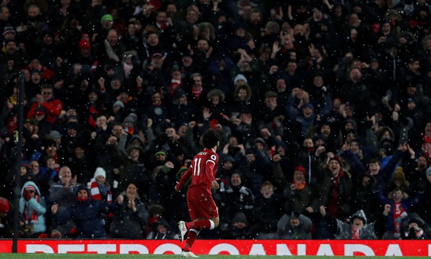 Soccer Football - Premier League - Liverpool vs Watford - Anfield, Liverpool, Britain - March 17, 2018 Liverpool's Mohamed Salah celebrates scoring their fourth goal and completes his hat-trick - REUTERS/Lee Smith