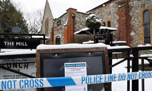 Police tape is seen in front of a pub which was visited by former Russian intelligence officer Sergei Skripal and his daughter Yulia before they were found on a park bench after being poisoned in Salisbury, Britain, March 19, 2018. REUTERS/Peter Nicholls

