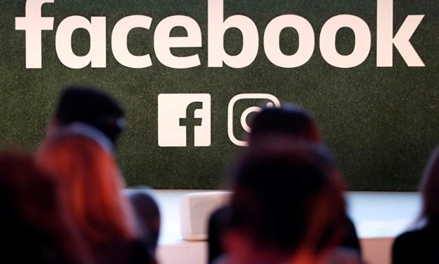 A Facebook logo is seen at the Facebook Gather conference in Brussels, Belgium January 23, 2018. REUTERS/Yves Herman/File Photo