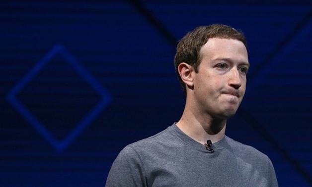 Facebook CEO Mark Zuckerberg, in his first public statement on the scandal engulfing the company, said the social network must "step up" and do more to protect user data - AFP
