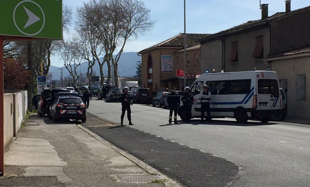 Police are seen at the scene of a hostage situation in a supermarket in Trebes, Aude, France March 23, 2018 in this picture obtained from a social media video. LA VIE A TREBES/via REUTERS
