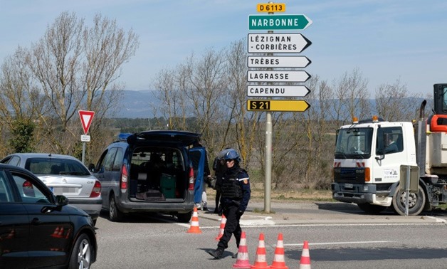 French gendarmes blocked access to the southwestern French town of Trebes after the start of the siege - AFP
