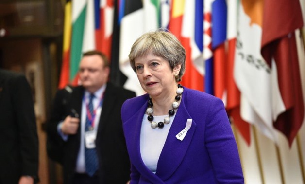 EU leaders have united behind British Prime Minister Theresa May in blaming Russia for a nerve agent attack on former double agent and his daughter in England (AFP Photo/JOHN THYS)

