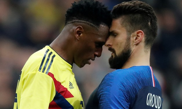 Soccer Football - International Friendly - France vs Colombia - Stade De France, Saint-Denis, France - March 23, 2018 France’s Olivier Giroud clashes with Colombia’s Yerry Mina REUTERS/Charles Platiau TPX IMAGES OF THE DAY
