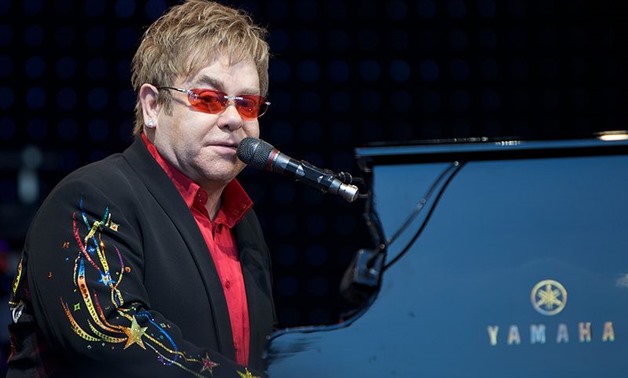 Photograph of Elton John performing in Norway, June 20, 2009 – Wikimedia Commons/Ernst Vikne