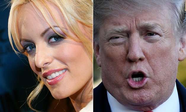 This combination of pictures created on March 25, 2018 shows a file photo of adult film actress Stormy Daniels and file photo of US President Donald Trump. — Reuters pic
