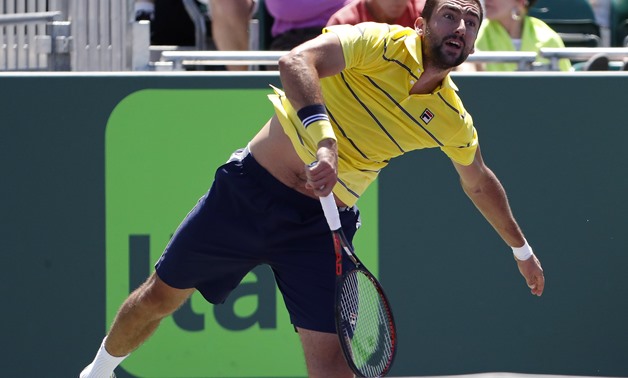 Mar 25, 2018; Key Biscayne, FL, USA; Marin Cilic of Croatia serves against Vasek Pospisil of Canada (not pictured) on day six of the Miami Open at Tennis Center at Crandon Park. Cilic won 7-5. 7-6(4). Mandatory Credit: Geoff Burke-USA TODAY Sports
