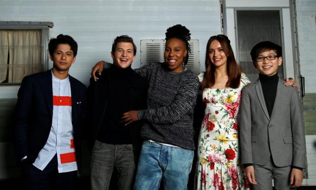 Cast members (L-R) Win Morisaki, Tye Sheridan, Lena Waithe, Olivia Cooke and Philip Zhao pose for a portrait while promoting the movie "Ready Player One" in Los Angeles, California, U.S., March 16, 2018. Picture taken March 16, 2018. REUTERS/Mario Anzuoni