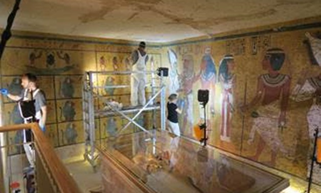 Conservation work on the wall paintings in the tomb © J. Paul Getty Trust,-Photo courtesy of statement by GCI.