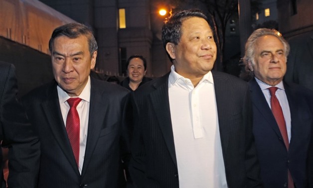 Ng Lap-seng, centre, leaves a federal court in Manhattan on Thursday after being convicted of briber, money laundering and conspiracy. Photo: AFP