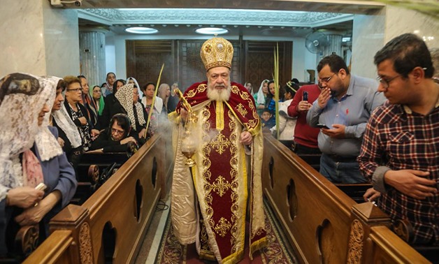 Bishop of Virgin Mary Coptic Orthodox Church attends a mass on Sunday to celebrate Palm Sunday, 1 April 2018 – Egypttoday/Mahmoud elHosry