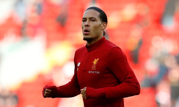 Soccer Football - Premier League - Liverpool vs Watford - Anfield, Liverpool, Britain - March 17, 2018 Liverpool's Virgil van Dijk warms up before the match REUTERS/Phil Noble