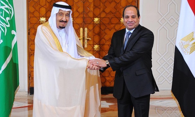 FILE - Egyptian President Abdel Fatah al-Sisi (R) with Saudi King Salman bin Abdul Aziz (L) 
