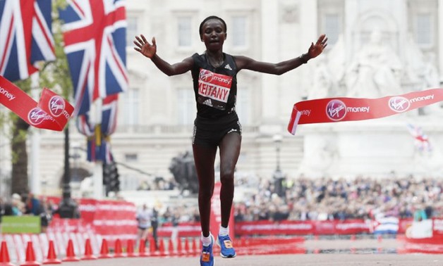 Kenya's Mary Keitany wins the London Marathon with an unofficial time of 2hrs 17min 01sec - AFP/Adrian DENNIS