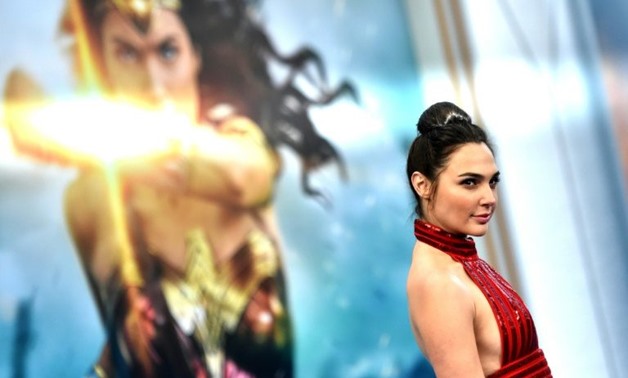 Gal Gadot is the star of "Wonder Woman," one of the blockbuster 2017 movies that helped propel the global box office take to a record $40.6 billion last year
