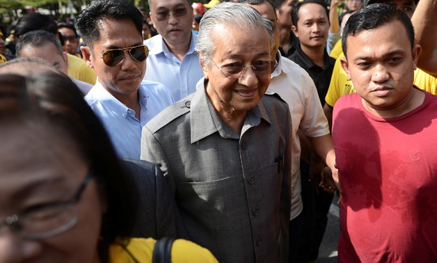Malaysia's opposition coalition prime ministerial candidate Mahathir Mohamad arrives at a protest against a controversial proposal to redraw electoral boundaries near the Parliament House in Kuala Lumpur, Malaysia March 28, 2018. REUTERS/Stringer