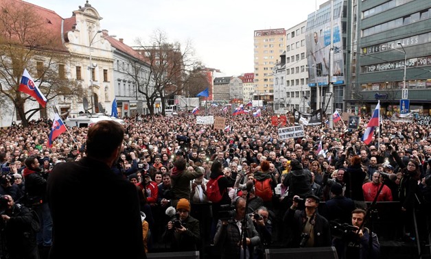 People attend a protest rally in reaction to the murder of Slovak investigative reporter Jan Kuciak and his fiancee Martina Kusnirova, in Bratislava, Slovakia April 5, 2018. REUTERS/Radovan Stoklasa