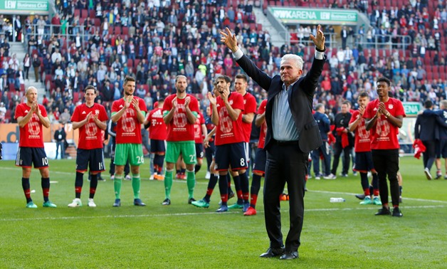 Soccer Football - Bundesliga - FC Augsburg vs Bayern Munich - WWK Arena, Augsburg, Germany - April 7, 2018 Bayern Munich coach Jupp Heynckes celebrates winning the league in front of the fans at the end of the match REUTERS/Michaela Rehle