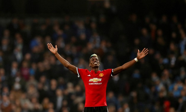 Soccer Football - Premier League - Manchester City vs Manchester United - Etihad Stadium, Manchester, Britain - April 7, 2018 Manchester United's Paul Pogba celebrates after the match REUTERS/Russell Cheyne