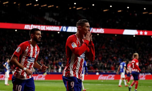  December 16, 2017 Atletico Madrid's Fernando Torres celebrates scoring their first goal with Yannick Carrasco REUTERS/Juan Medina