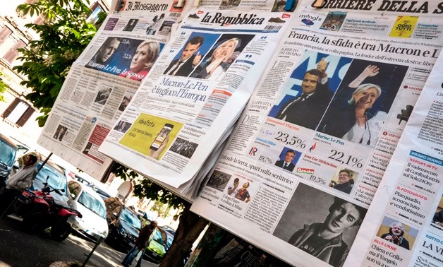 front pages of Italian newspapers reporting on France's presidential election - AFP