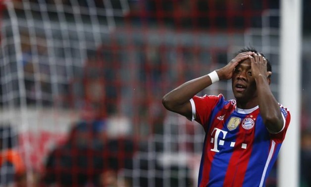 Bayern Munich's David Alaba reacts after missing a chance to score during their Champions League Group E second leg soccer match against AS Roma in Munich November 5, 2014. REUTERS/Michael Dalder
