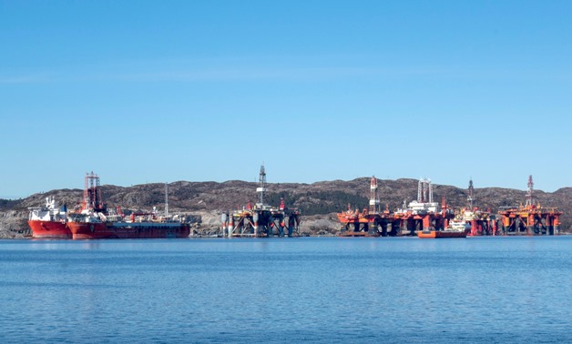 Drilling rigs and ships anchored in Skipavika, Norway April 1, 2018. REUTERS/Gwladys Fouche/File Photo
