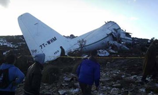 A crashed military plane is pictured in Oum El Bouaghi province, about 500km from the capital Algiers - Reuters