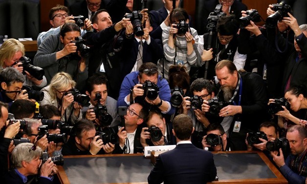 Facebook CEO Mark Zuckerberg is surrounded by members of the media as he arrives to testify before a Senate Judiciary and Commerce Committees joint hearing regarding the company’s use and protection of user data, on Capitol Hill in Washington, U.S., April