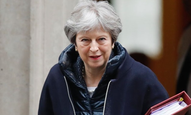 Prime Minister Theresa May was holding an emergency cabinet to discuss joining mooted strikes by the US and allies, as rival politicians and some Conservative colleagues called for a parliamentary vote before any British involvement (AFP Photo/Tolga AKMEN