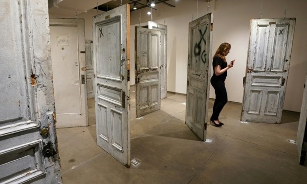 Chelsea Hotel doors to rooms where celebrities from Mark Twain to Madonna stayed fetched thousands of dollars at auction
