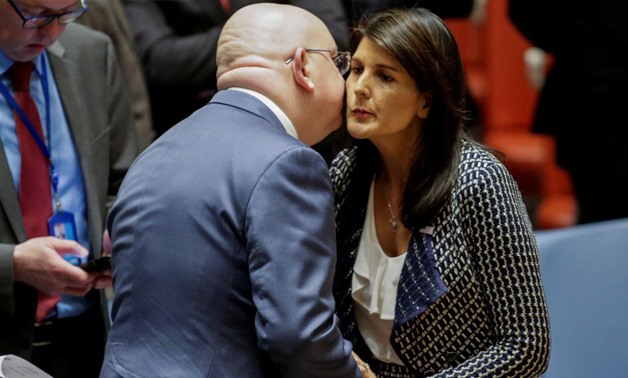 United States Ambassador to the United Nations Nikki Haley greets Russian Ambassador to the United Nations Vasily Nebenzya before the United Nations Security Council meeting on Syria at the U.N. headquarters in New York, U.S., April 13, 2018. REUTERS/Edua