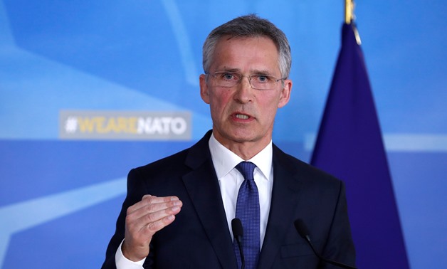 NATO Secretary-General Jens Stoltenberg addresses a news conference after a meeting of the Alliance's 29 ambassadors in Brussels, Belgium April 14, 2018. REUTERS/Yves Herman