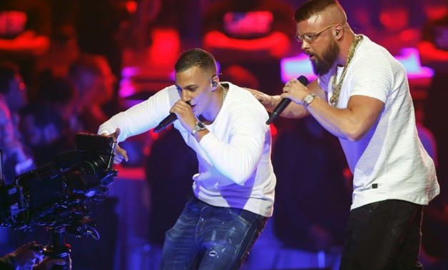 German rappers Kollegah and Farid Bang perform during the 2018 Echo Music Awards ceremony in Berlin on Thursday

